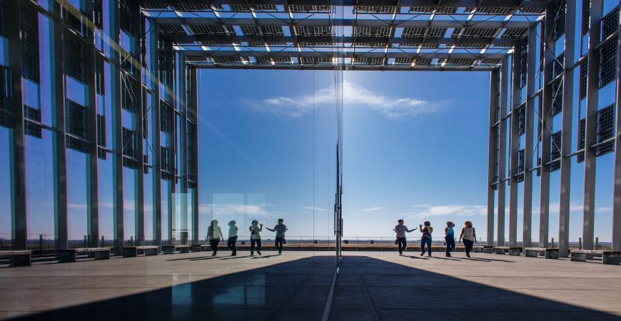 Students walking under solar breezeway