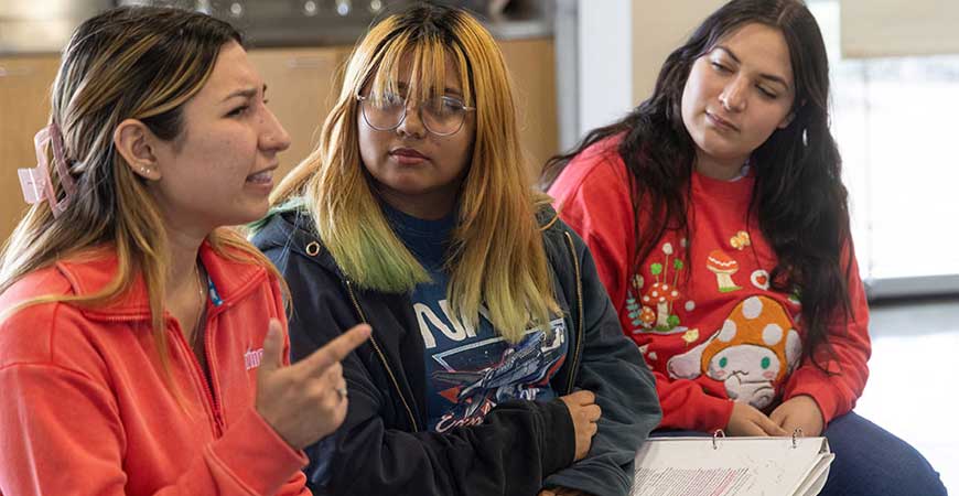 Students rehearse for "26 Pebbles" play